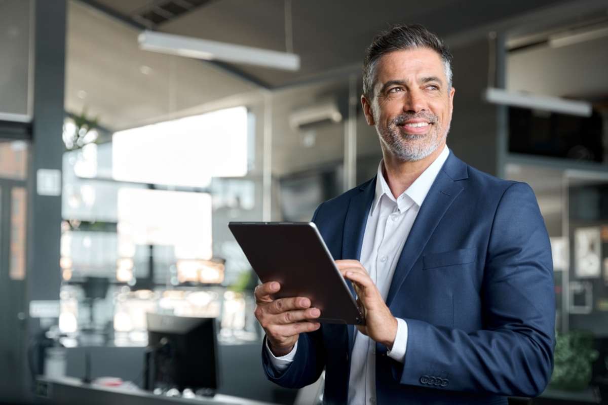 A happy investor experiences the benefits of commercial real estate investment