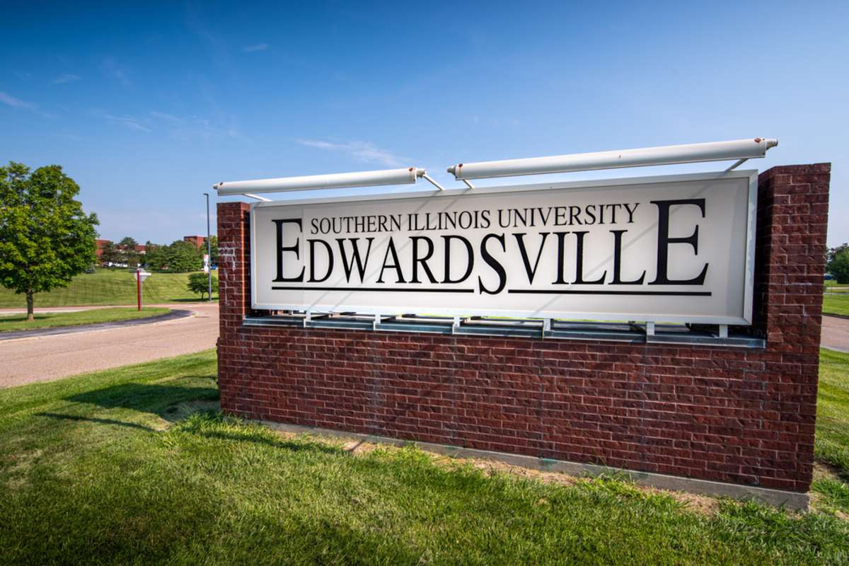 A sign for Southern Illinois University Edwardsville near real estate in Chicago suburbs
