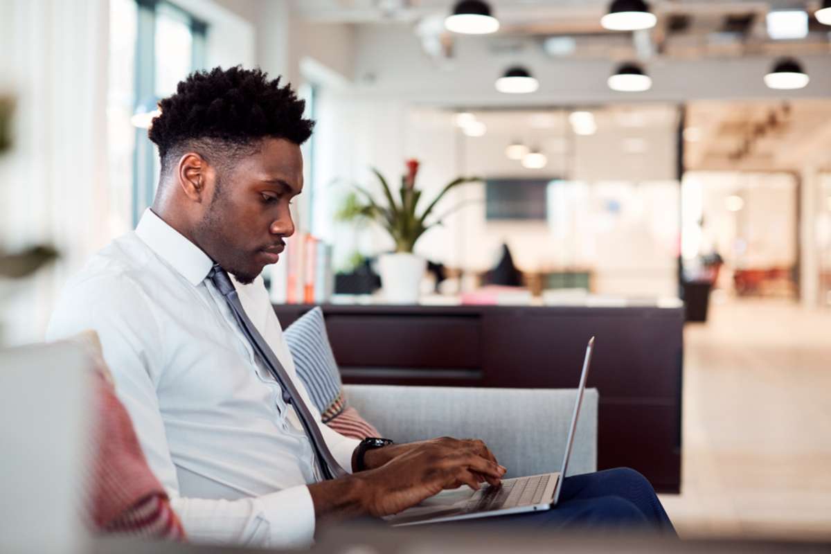 Businessman working in a flex space, Chicago property management commercial real estate trends