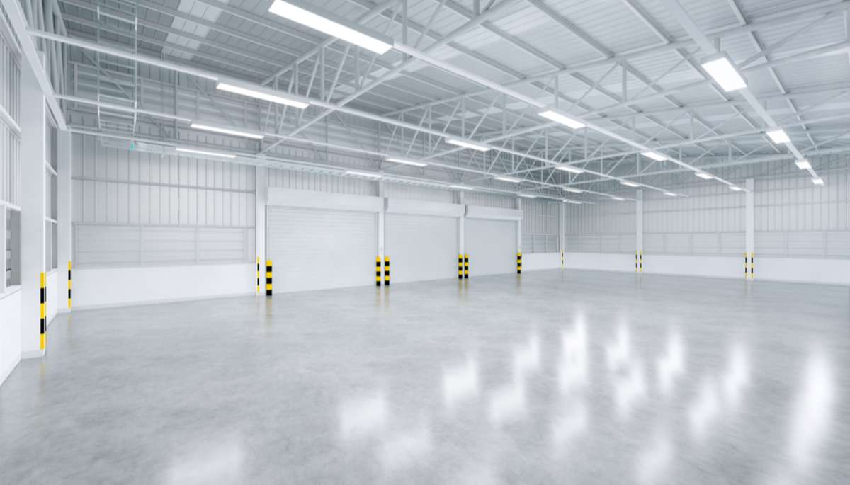 Empty warehouse interior, property management Chicago concept