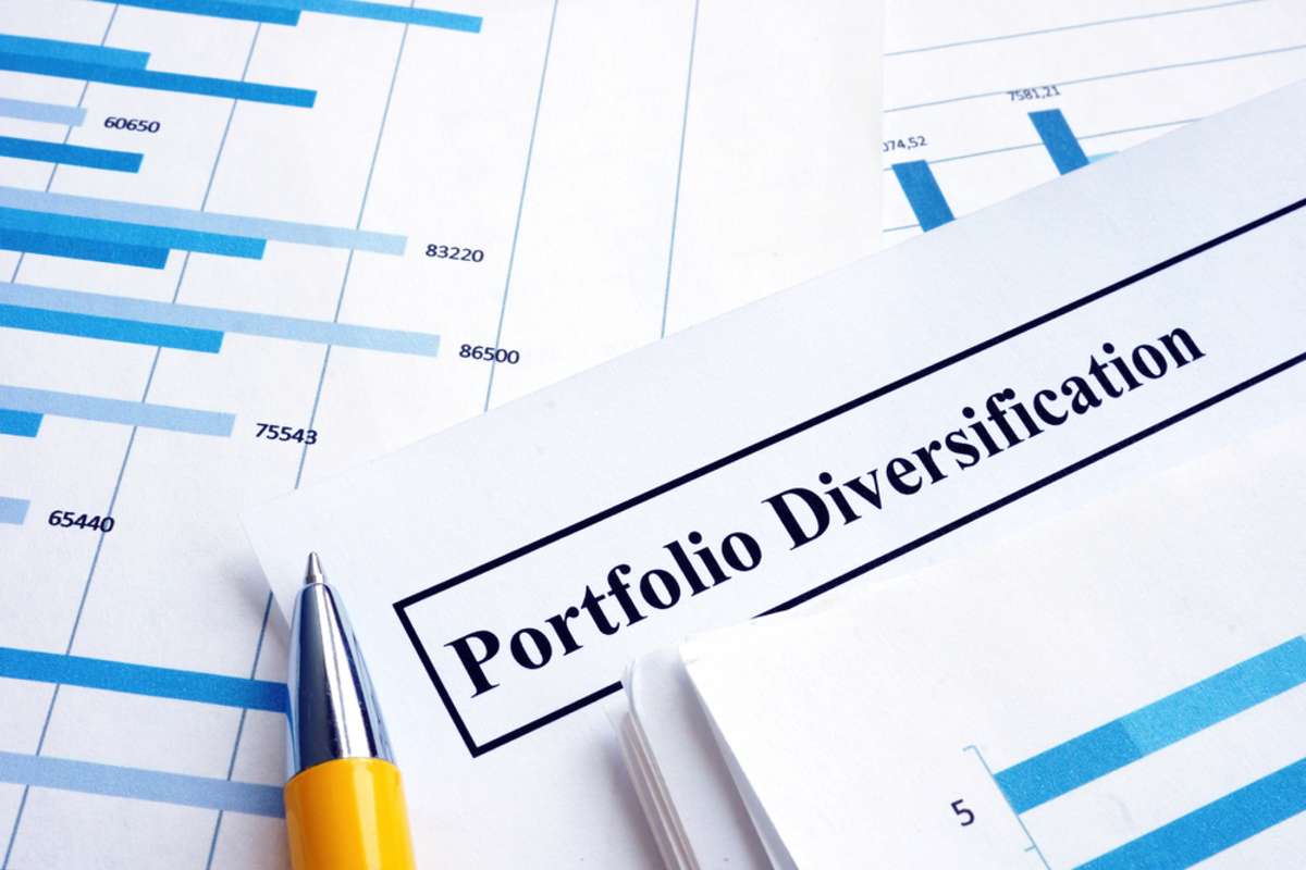 Portfolio diversification on a document, commercial real estate investment concept