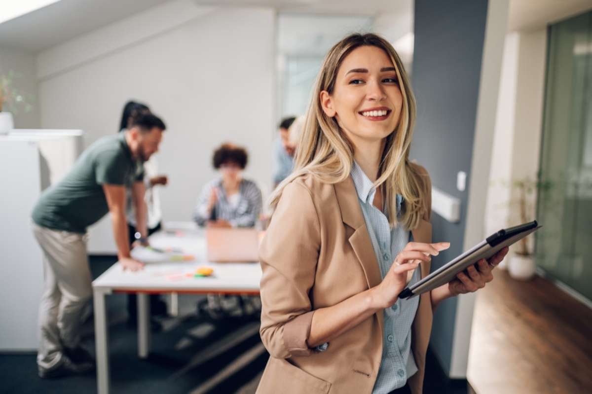 Smiling businesswoman, Chicago commercial property management companies concept