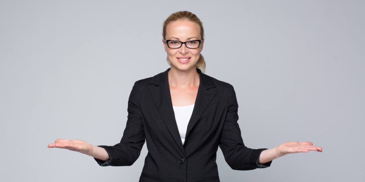 Business woman showing hands sign to sides